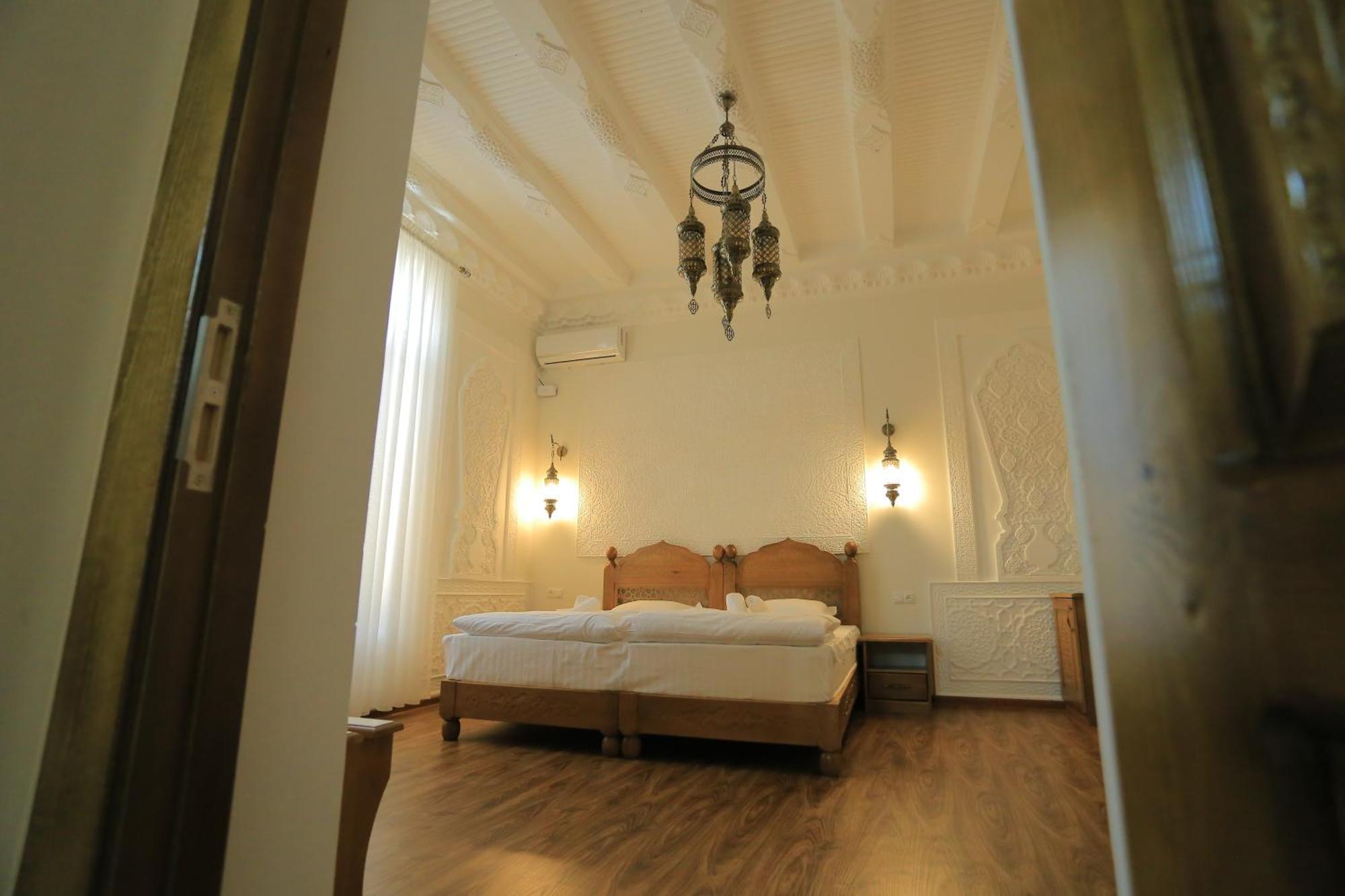 Guesthouse Muqaddam Бухара Екстер'єр фото