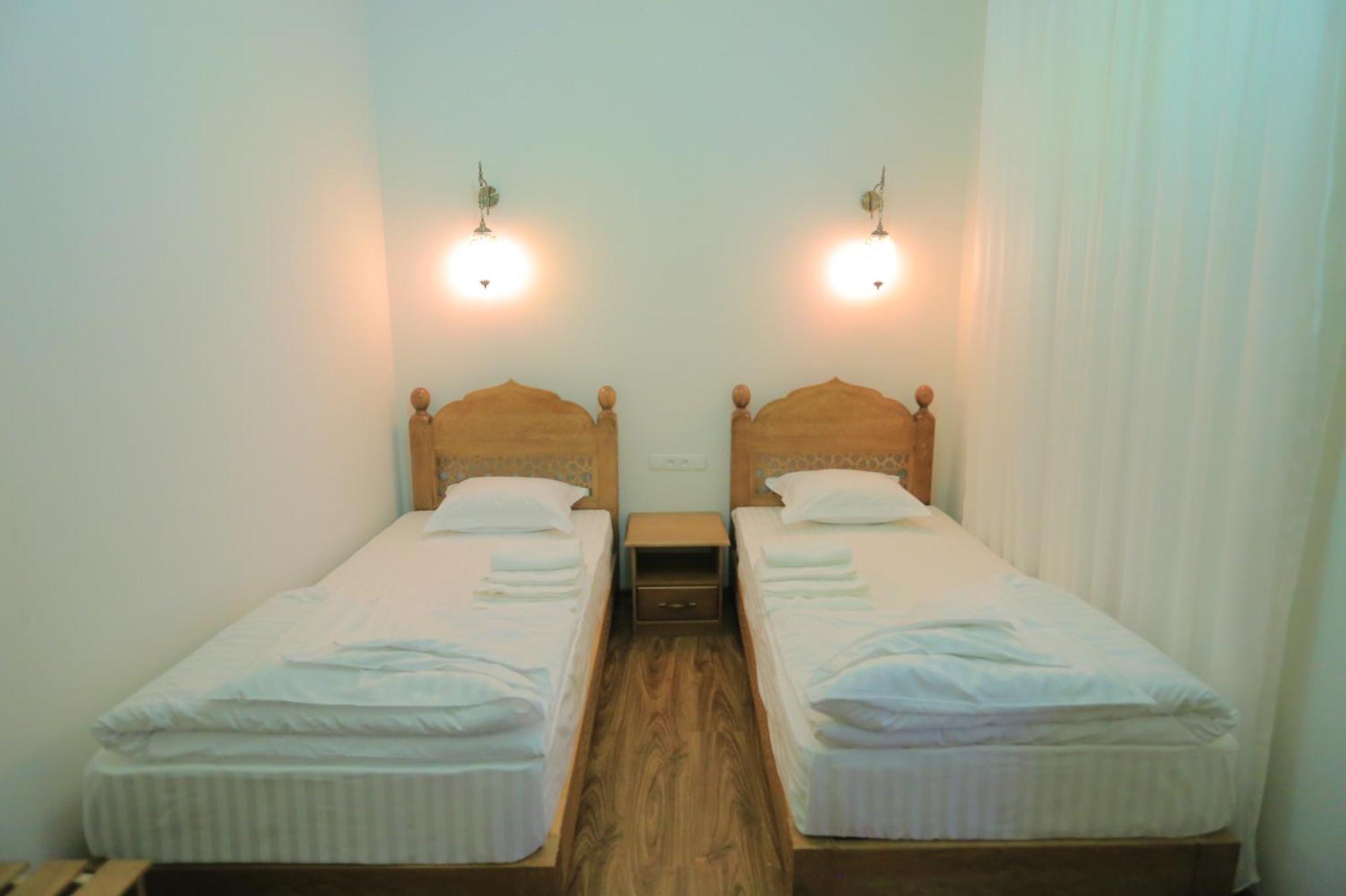 Guesthouse Muqaddam Бухара Екстер'єр фото