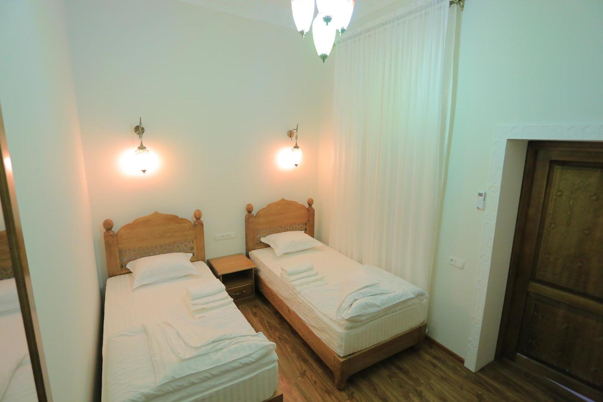 Guesthouse Muqaddam Бухара Екстер'єр фото